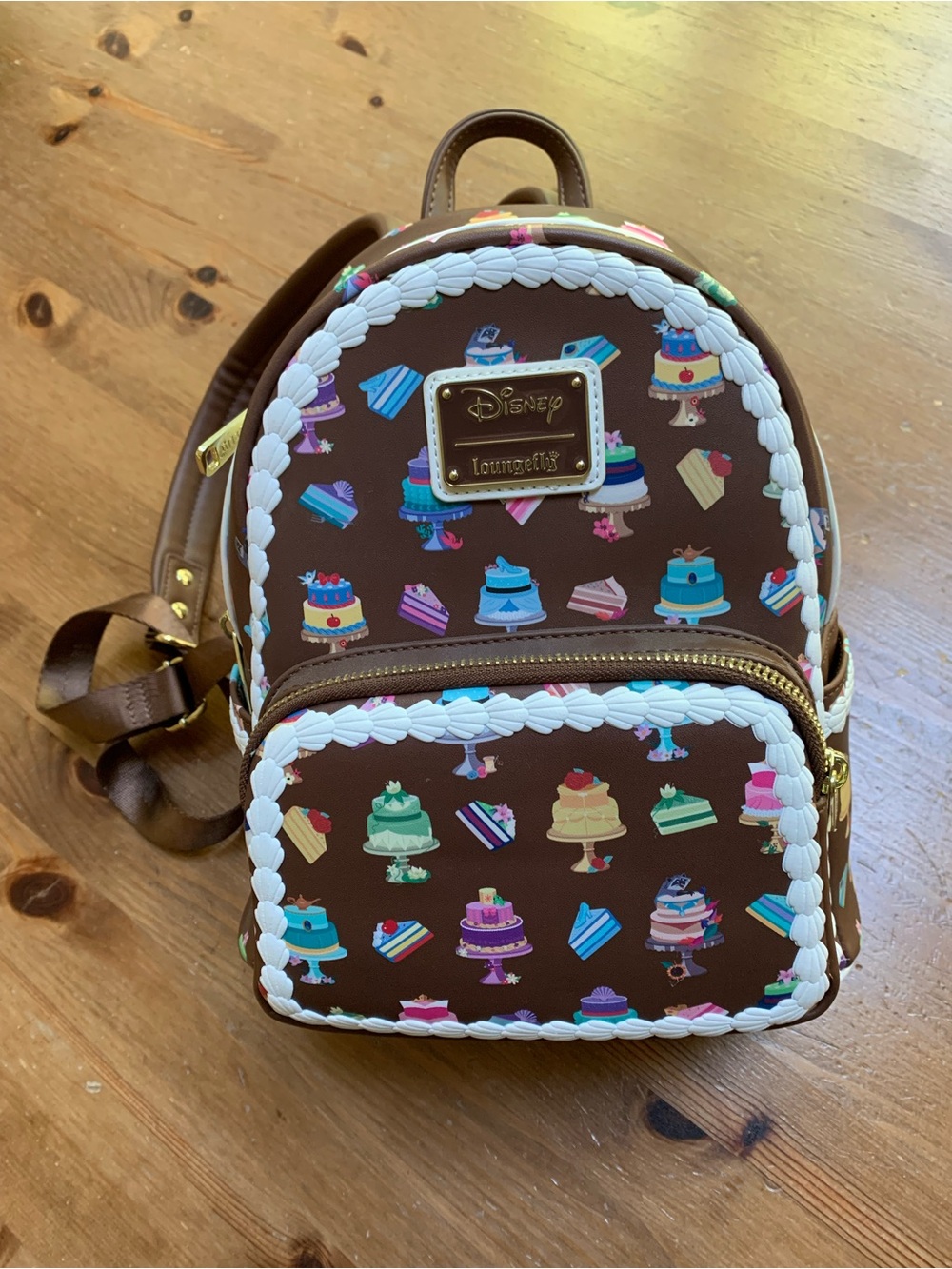 Disney Loungefly Brown Mini Backpack with Colorful Cake Print